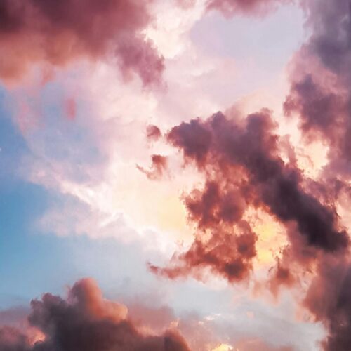 down angle photography of red clouds and blue sky